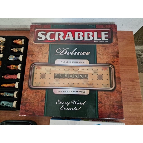 393 - Collection of Board / Table (& Floor!) Games; Deluxe Scrabble, Boxed Set of Chess Pieces, Dominoes, ... 