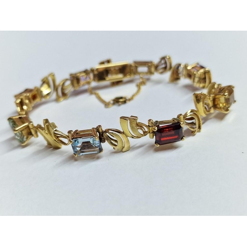 173 - Elegant 18ct Gold Bracelet with 8 x Multi-Colour / Assorted Gemstones Between Decorative Links or Sp... 