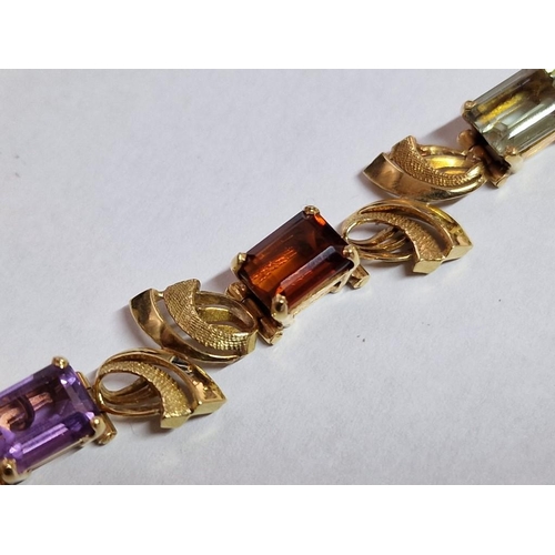 173 - Elegant 18ct Gold Bracelet with 8 x Multi-Colour / Assorted Gemstones Between Decorative Links or Sp... 