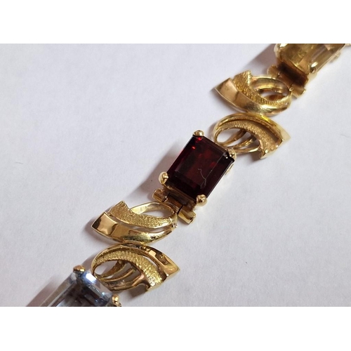 173 - Elegant 18ct Gold Bracelet with 8 x Multi-Colour / Assorted Gemstones Between Decorative Links or Sp... 