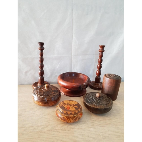 39 - 7 'Treen' Items - 2 Candlesticks (25cm High). Large Candle Holder, 3 Carved Lidded Bowls and Round P... 