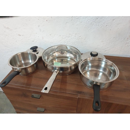 417 - 3 x Lidded Stainless Steel Saucepans, (3)