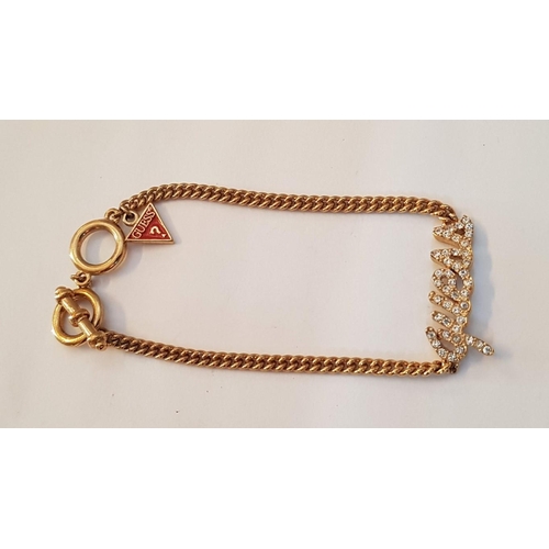 258 - 'Guess' Gold Tone Matching Bracelet and Necklace, Motif in Clear Stones, (Approx. L: 19 and 39cm), (... 