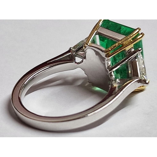 173A - Columbian Emerald, Diamond and 18ct Gold Ring; Rectangular Step Cut Columbian Emerald (Approx. 9.15c... 