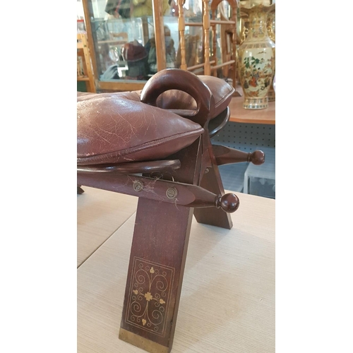 199 - Vintage Wood and Leather Oriental Camel Saddle Stool with Brass Details, (Approx. 78 x 38 x 42cm)