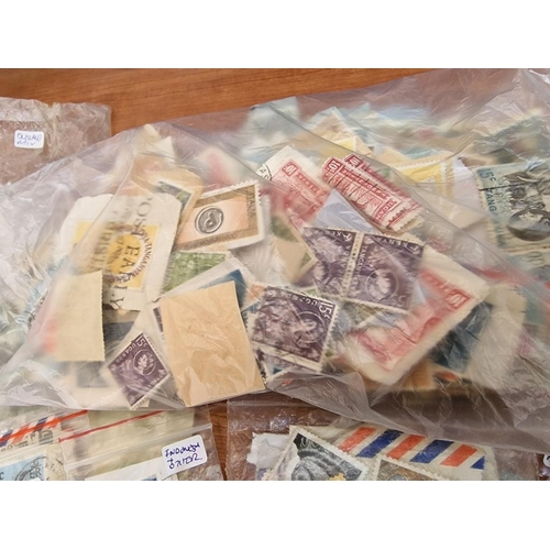 168B - Large Collection of Assorted World Stamps, Arranged in Bags by Different Countries and Mixed, (see m... 