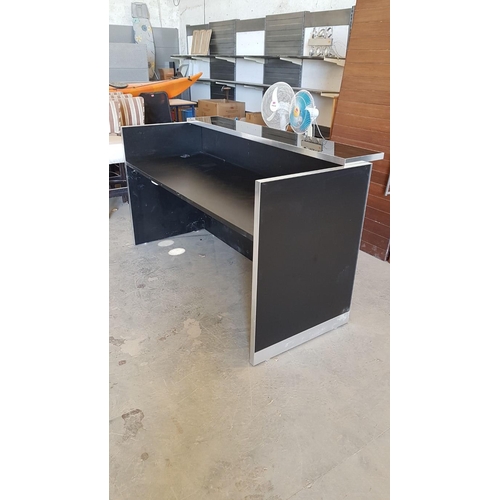 669 - Modern Reception Desk, in Black Colour with Metal Trim and Glass Counter Top, (Approx. 188 x 88)