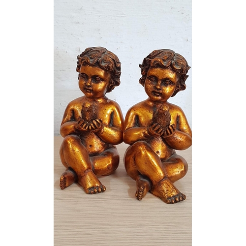 249 - 2 x Sweet Putti Figurines, Gold Tone Little Boys Holding Birds, (Approx. H: 20cm each), Repair noted... 