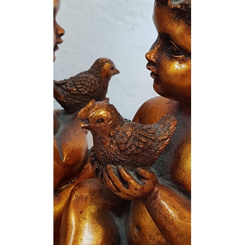 249 - 2 x Sweet Putti Figurines, Gold Tone Little Boys Holding Birds, (Approx. H: 20cm each), Repair noted... 