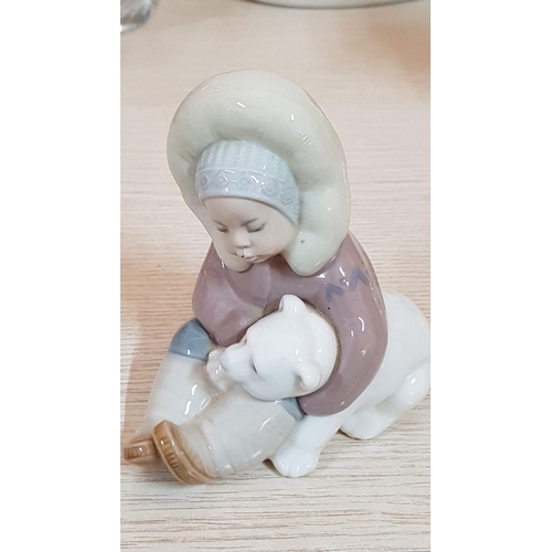 180 - Lladro Eskimo Boy with a Polar Bear - Spanish Porcelain Figurine (12.5cm)