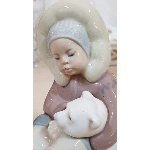 180 - Lladro Eskimo Boy with a Polar Bear - Spanish Porcelain Figurine (12.5cm)