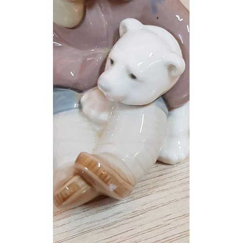 180 - Lladro Eskimo Boy with a Polar Bear - Spanish Porcelain Figurine (12.5cm)