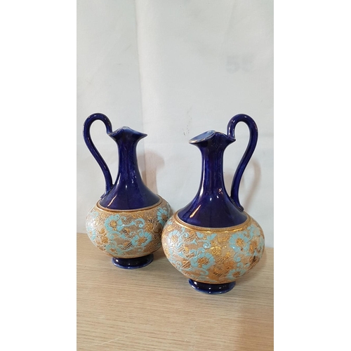 19 - Pair Royal Doulton cobalt blue ewers with tapestry design in gold and pale blue – 24cm high