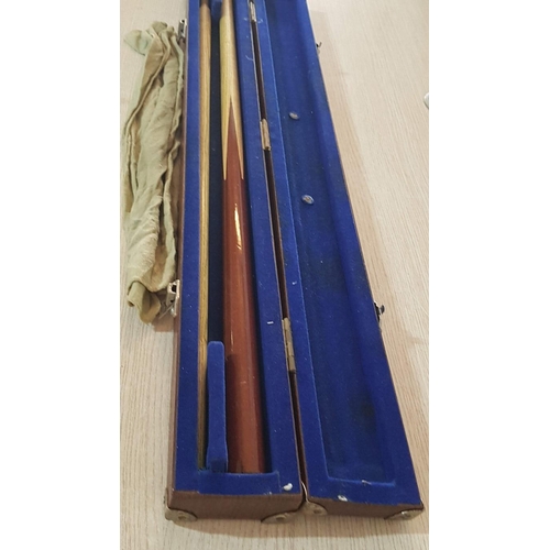 59 - 2 piece snooker cue in velvet lined case with chalk