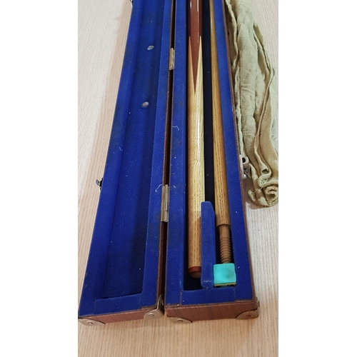 59 - 2 piece snooker cue in velvet lined case with chalk