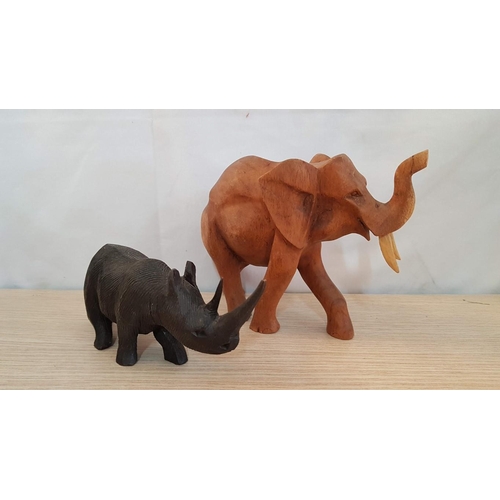 76 - Wooden animal themed items – 2 Ducks, Pelican, Parrot, Rhino, Zebra, Elephant, and Monkey (8 pcs)