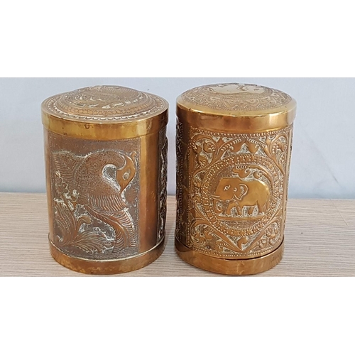 78 - Vintage embossed Indian brass tea holders – one showing Elephants and one showing Peacocks – 10 cm x... 