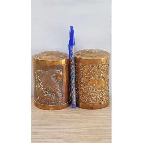 78 - Vintage embossed Indian brass tea holders – one showing Elephants and one showing Peacocks – 10 cm x... 