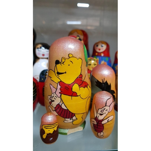 79 - 7 sets Matryoshka Russian stacking dolls – 1 x 7 pcs, 2 x 3 pcs, 4 x 4 pcs and 2 porcelain dolls – 1... 