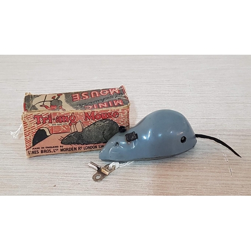 82 - Tri-ang Mouse. Minic clockwork mouse with key with original box. Mid 1950’s working when listed