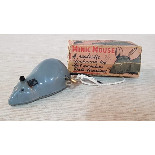 82 - Tri-ang Mouse. Minic clockwork mouse with key with original box. Mid 1950’s working when listed