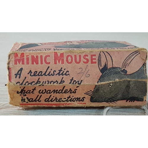 82 - Tri-ang Mouse. Minic clockwork mouse with key with original box. Mid 1950’s working when listed