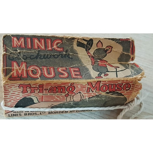 82 - Tri-ang Mouse. Minic clockwork mouse with key with original box. Mid 1950’s working when listed