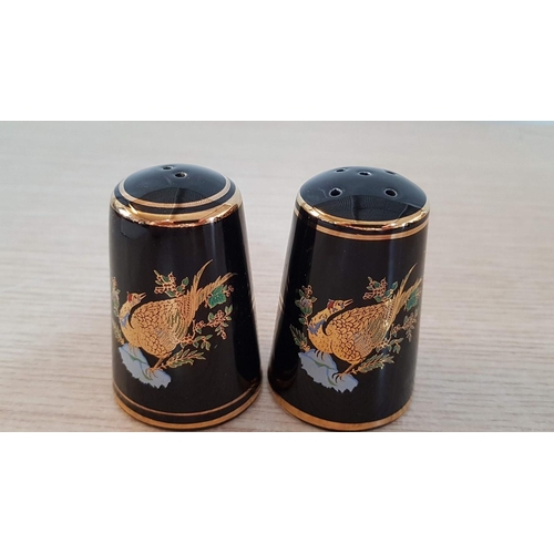 84 - Grecian black and gold pieces of porcelain Exotic Creatures. 2 vases – 22cm & 17cm, 2 lidded pots – ... 