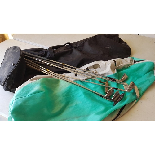 693 - 2 x Golf Club Covers (Large Black and Small Blue) and Quantity of Assorted Golf Clubs, Incl. 'Bronty... 