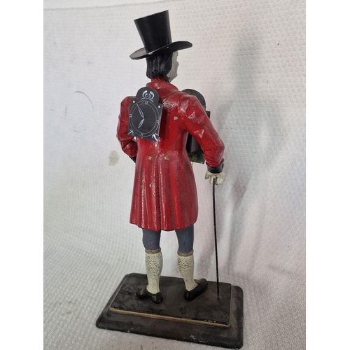 10 - Cast Iron Peddler Clock; Male Figure with Top Hat and Cane, Standing (Approx. H:41cm) with Key Wound... 