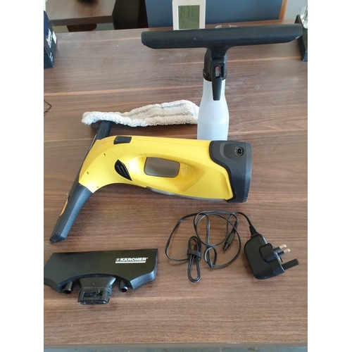 222 - Karcher cordless window cleaner and attatchments. Looks unused, basic test and working