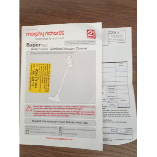 223 - Morphy Richards cordless, bagless vacuum cleaner with attachments. (basic test and working)