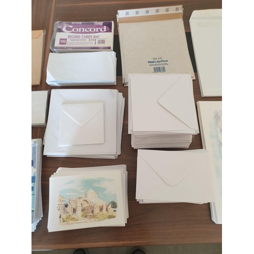 332 - Very large collection of assorted size envelopes and prints, all unused and some in original packagi... 