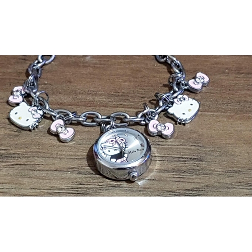 150 - Silver Tone Bracelets; 'Hello Kitty' with Watch Charm, and Charm Locket with Blue Stone Bracelet