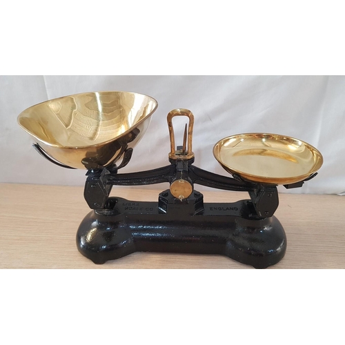 22 - Vintage Libra heavy cast iron kitchen scales with 2 brass pans and set of 7 brass bell weights