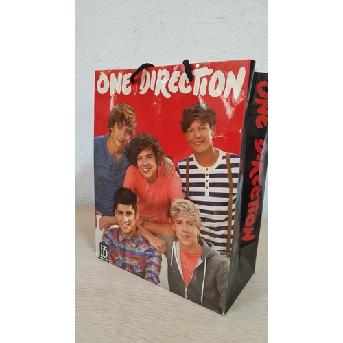 250 - One Direction Accessories; 'This is Us' Documentary, Concert Film DVD, Gift Bag, Lunch Bag and Drink... 