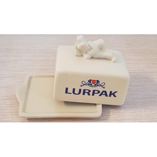 37 - Lurpak breakfast set.  Comprising toast rack, lidded butter dish and two different Lurpak character ... 