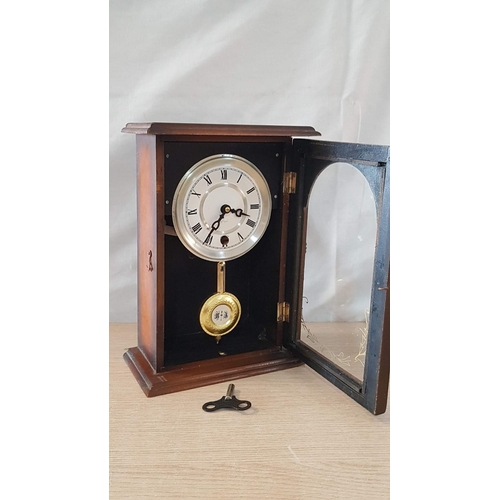 42 - Mechanical 15 day Mantle/wall hanging clock with pendulum and key, white face with Roman numerals. W... 