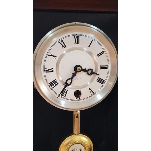 42 - Mechanical 15 day Mantle/wall hanging clock with pendulum and key, white face with Roman numerals. W... 