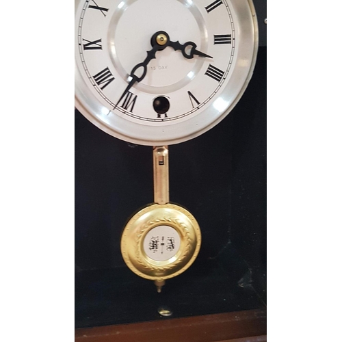 42 - Mechanical 15 day Mantle/wall hanging clock with pendulum and key, white face with Roman numerals. W... 