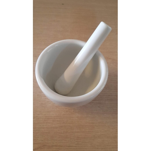 67 - Unused and boxed Pestle & Mortar in white porcelain – 13cm diameter x 10 high