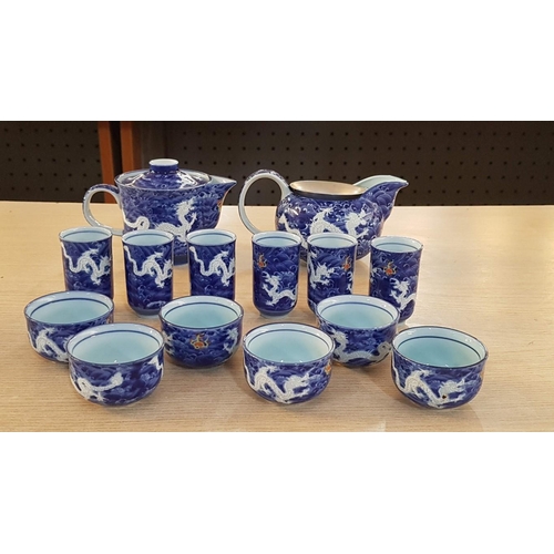 17 - Japanese service of Tea bowls, sake cups with water jug, and strainer in teapot in ‘Deep Blue Dragon... 