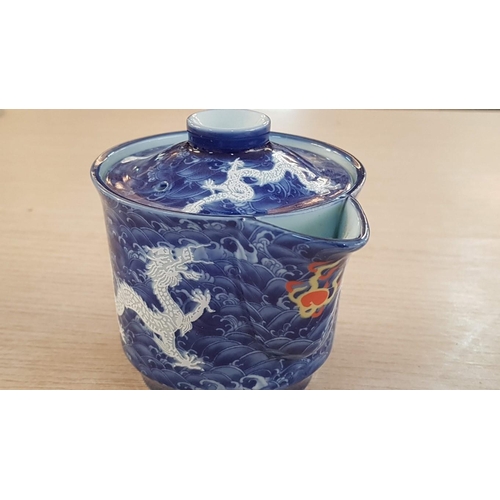 17 - Japanese service of Tea bowls, sake cups with water jug, and strainer in teapot in ‘Deep Blue Dragon... 