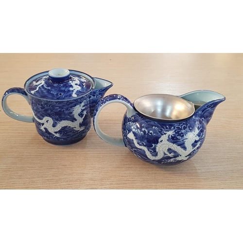 17 - Japanese service of Tea bowls, sake cups with water jug, and strainer in teapot in ‘Deep Blue Dragon... 