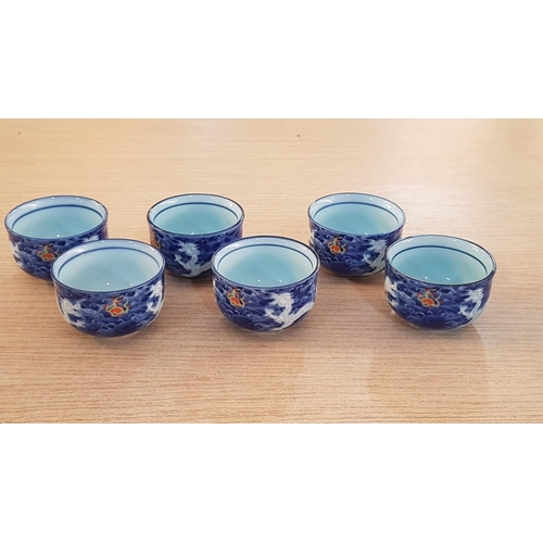 17 - Japanese service of Tea bowls, sake cups with water jug, and strainer in teapot in ‘Deep Blue Dragon... 