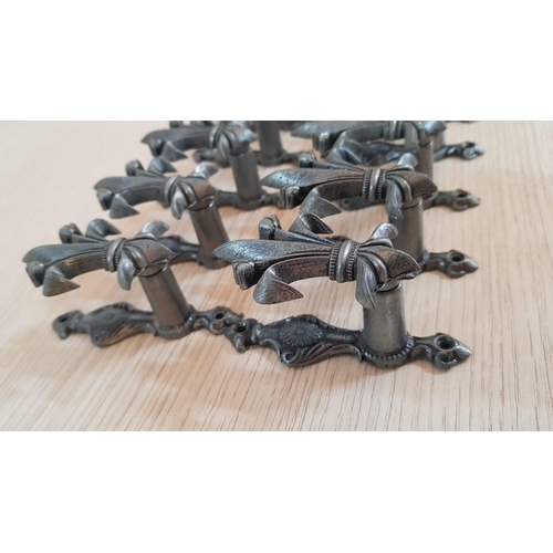 357 - 'Fleur De Lis' Expandable Sword Hangers, Collection of 16 Pcs, Cast Metal and Feature a Darkened Sil... 