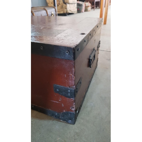 88 - Heavy wooden trunk with metal reinforcements, handles, stay, knob and key – 84cm x 48 x 33