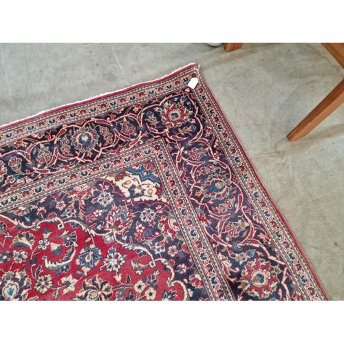 321 - Large Persian Style Carpet in Traditional Pattern with Centre Medallion and Decorative Border in Red... 