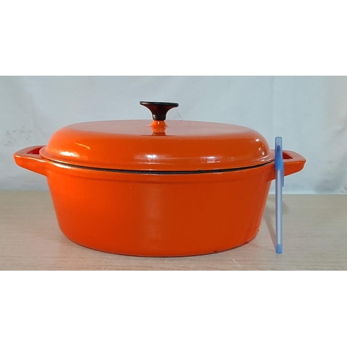 25D - 'Vogue' Large Cast Iron Oval Lidded Casserole Dish, Enameled, Off White Interior and Orange Exterior... 