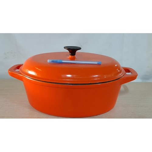 25D - 'Vogue' Large Cast Iron Oval Lidded Casserole Dish, Enameled, Off White Interior and Orange Exterior... 